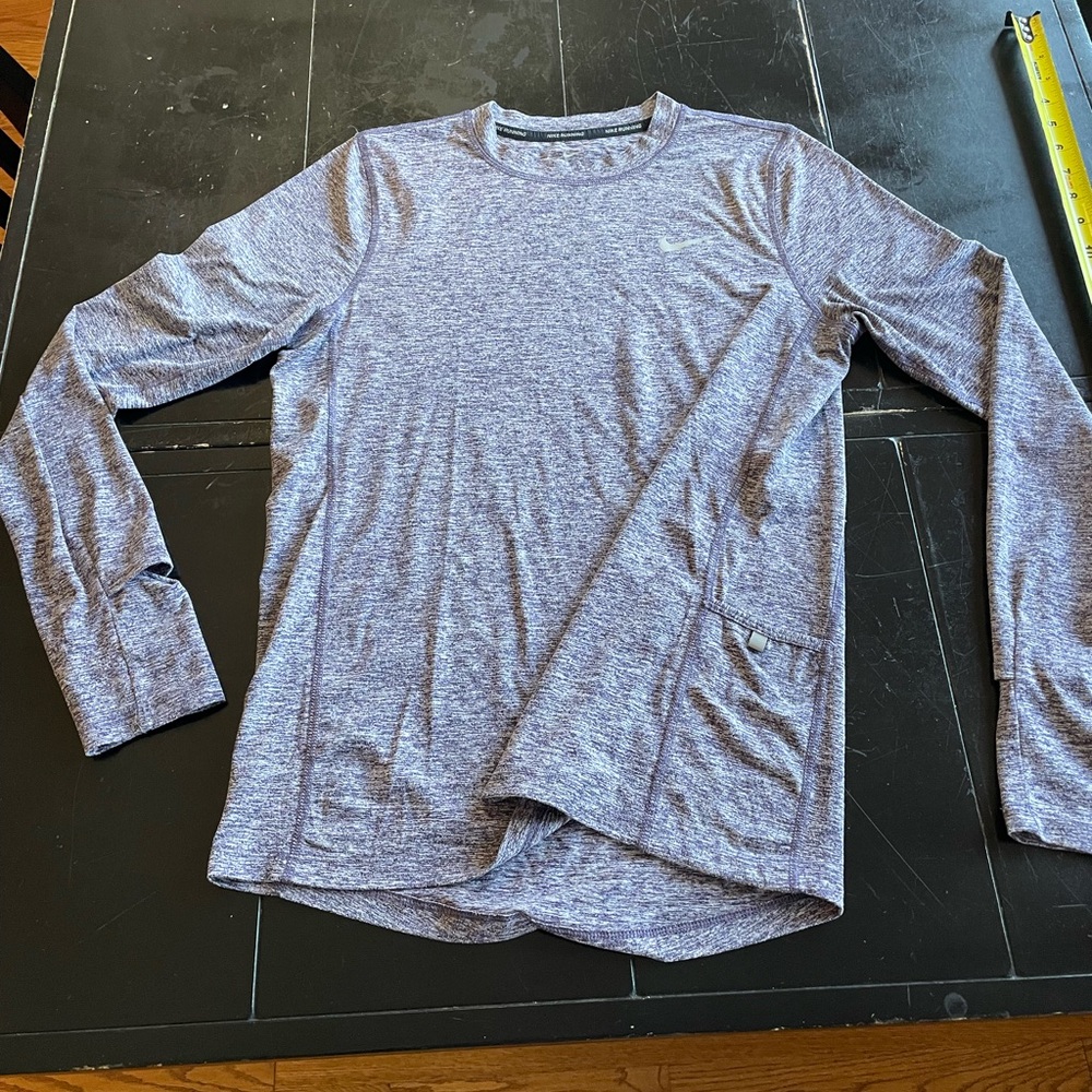 Nike Women’s Dri-Fit Long Sleeve Shirt, pocket and thumb holes.